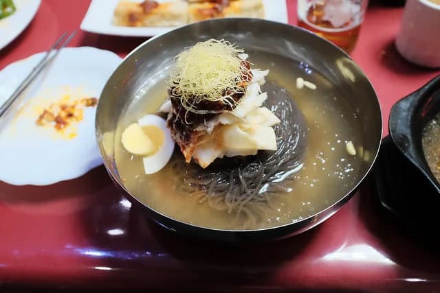 2016-10-15 Naengmyeon with boiled eggs in stainless steel bowl in Pyongyang.jpg